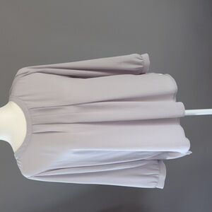 3 for $30. NWOT Flowy grey blouse with buttons down the back